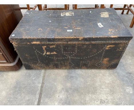 A VICTORIAN LEATHER COVERED AND STUDDED TRUNK, 36" WIDE 