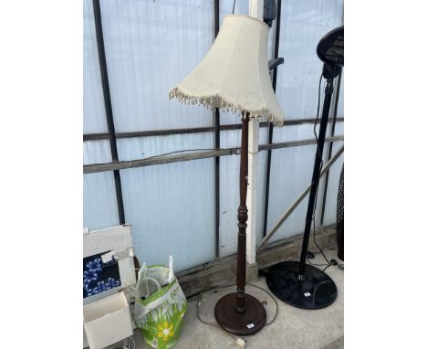 A WOODEN STANDARD LAMP WITH SHADE 