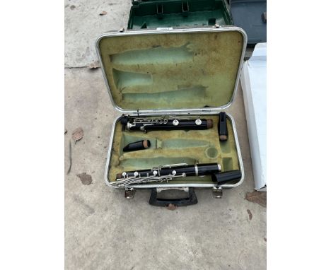 A PART COMPLETE BOOSEY &amp; HAWKES LONDON CLARINET WITH CARRY CASE 