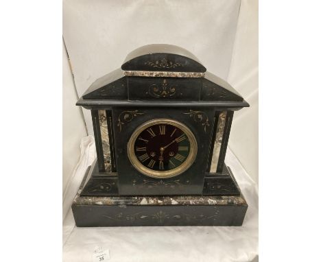 A LARGE DECORATIVE MARBLE AND SLATE MANTLE CLOCK 