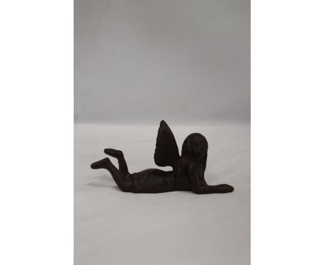 A CAST MODEL OF AN ANGEL, HEIGHT 9CM, LENGTH 21CM 