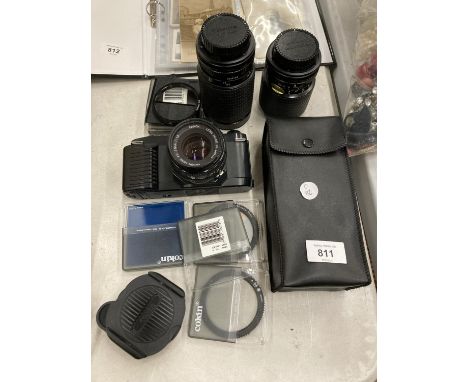 A CANON T50 CAMERA, 3 LENSES, ASSORTED FILTERS AND EXTRAS 