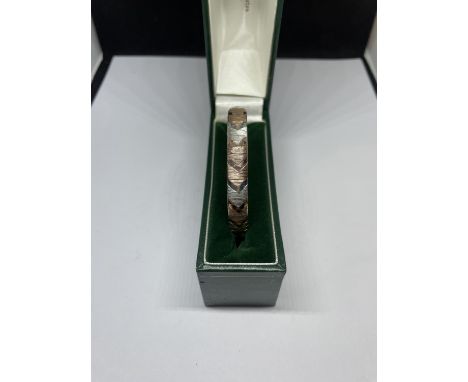 A BOXED SILVER TRI COLOUR BANGLE 