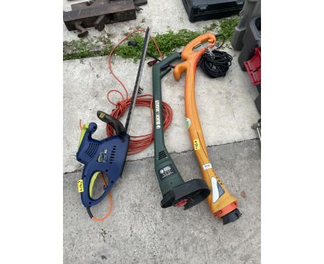 THREE ELECTRIC GARDEN TOOLS TO INCLUDE TWO STRIMMERS AND A XTREME HEDGE CUTTER 