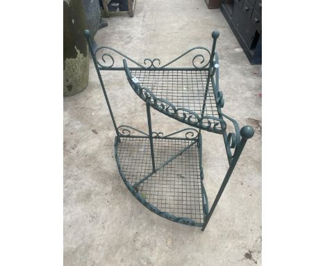A VINTAGE WROUGHT IRON GARDEN CORNER PLANT STAND 