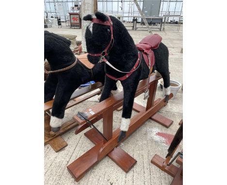 A VINTAGE PEGASUS BLACK AND WHITE ROCKING HORSE 