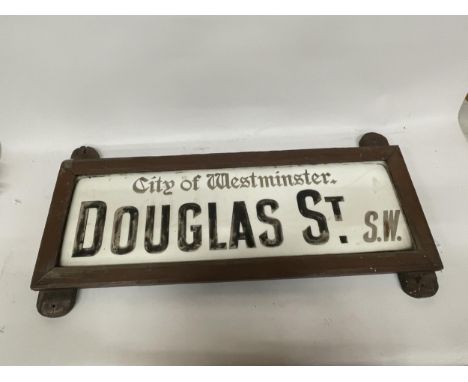 A WOODEN FRAMED ORIGINAL GLASS VINTAGE ROAD SIGN CITY OF WESTMINSTER DOUGLAS STREET SW 