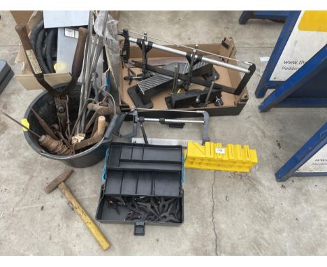 AN ASSORTMENT OF TOOLS TO INCLUDE TWO MITRE SAWS, CLIPS AND A WALL PAPER STRIPPER ETC 