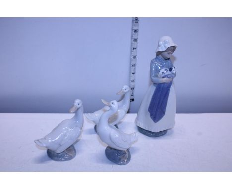 Three Nao Geese and one other Nao figure 