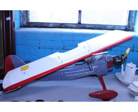 A large model aeroplane with petrol engine, shipping unavailable 