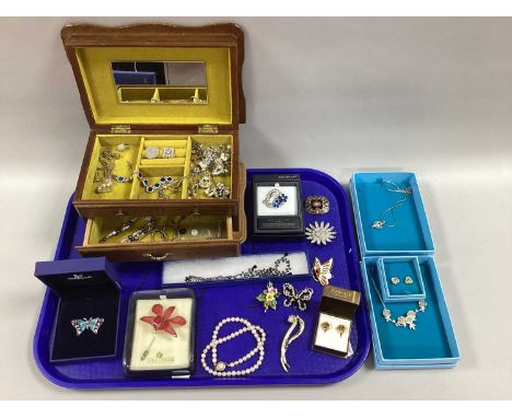 Swarovski; A Modern Butterfly Brooch, in original box, together with other inset brooches, a single strand freshwater pearl b