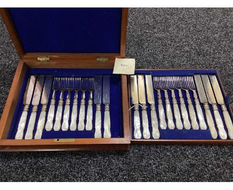 Decorative Antique Mother of Pearl Handled Dessert Knives and Forks, (lacking one knife) in original fitted wooden case.