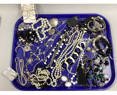 An Assortment of Modern Costume Jewellery, including diamanté ear cuff, imitation pearl bead necklaces, enamel T-bar panel br