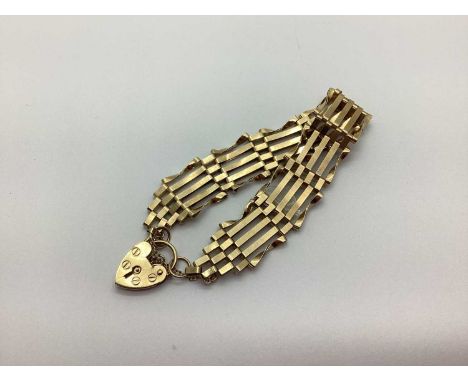 A 9ct Gold Gate Link Bracelet of Panel Design, stamped "ASJ", featuring a heart padlock and safety chain (total weight 10gram