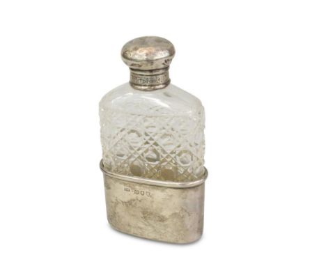 the facet cut glass flask with a silver detachable cup and lid