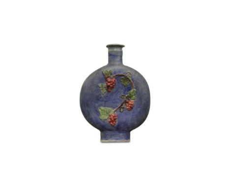 in the form of a moon flask with grapevine decoration in relief, 25 cm high