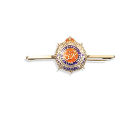 the silver bar brooch with a sunburst GR device decorated in blue and red enamel