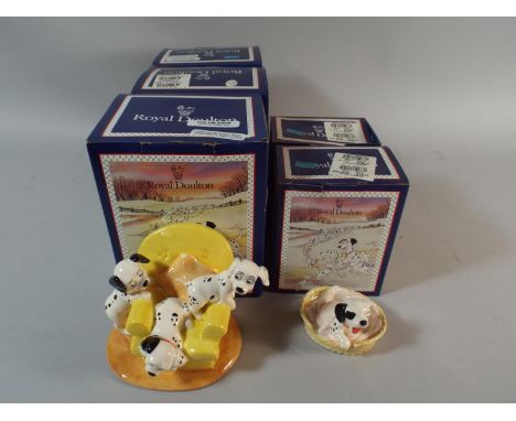 A Collection of Five Boxed Royal Doulton 101 Dalmation Figures to Include Pups in Armchair and Patch in Basket 