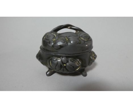 A Pewter Art Nouveau Trinket Box with Embossed Decoration