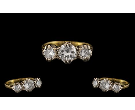 18ct Gold Attractive and Quality Three Stone Diamond Set Ring marked 18ct to interior of shank. All round brilliant cut diamo