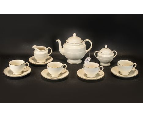 Wedgwood 'Jubilee' Tea Service comprising Tea Pot, Milk Jug, Lidded Sugar Bowl, four tea cups and six saucers.  All in good c