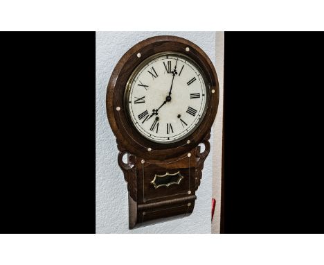 A Drop Dial Wall Clock rosewood case with mother of pearl inlay , tin dial with Roman Numerals. Spring movement with pendulum
