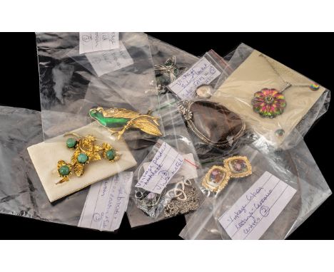 Collection of Vintage Jewellery including silver and designer items, comprising: Vintage brooch and clip on earring set in gi