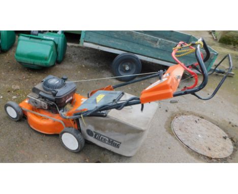 An Oleo-Mac Serie G rotary mower, with self drive mechanism, and Briggs &amp; Stratton 55 engine.
