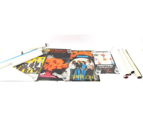 1980's pop music posters, to include Split Enz., Climax Blues Band., The Eagles., Kate Bush., Nazareth., and The Stiffs., an 