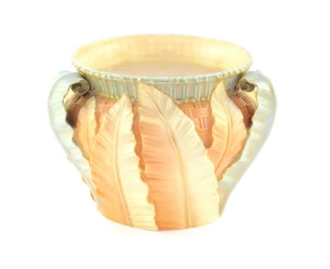 A Royal Worcester late 19thC porcelain blush ware jardiniere, with basket weave and leaf moulded decoration, shape No 1947, p