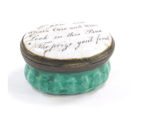 A Georgian Bilston enamel patch box, of oval form, written to the lid, 'If You Seek What's Fair And Kind Look In This Box The