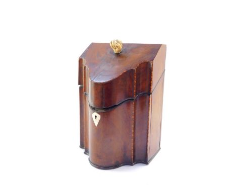 A George III mahogany and box wood strung serpentine knife box, with ivory fist handle, and plain interior, with diamond escu