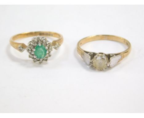 A 9ct gold emerald and diamond cluster ring, size K, and a 9ct gold and zircon solitaire ring, size K, 3.5g. (2)