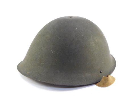 A WWII British Army helmet, dated 1945.