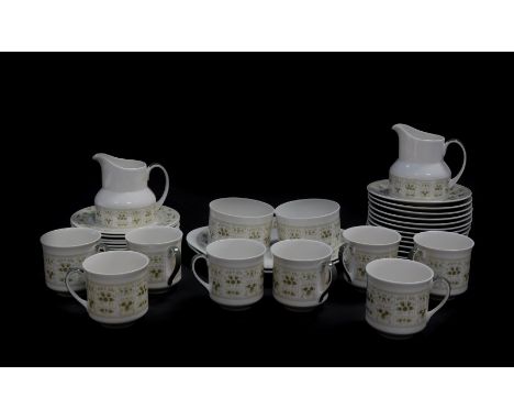 A Royal Doulton porcelain tea service decorated in the Samarra pattern, comprising a pair of bread plates, a pair of cream ju