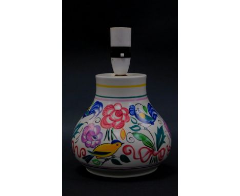 A 20thC Poole pottery table lamp, traditionally decorated with birds and flowers, 17cm high. 