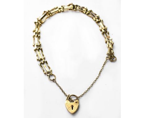 A hallmarked 9ct gold dainty three-bar gate bracelet with 9ct gold heart clasp, length 15cm, approx 3.4g.