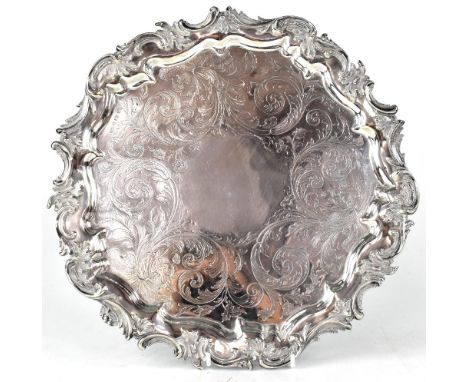 A William IV hallmarked silver tray with Rococo-style C-scroll border, the centre with engraved foliate and floral decoration
