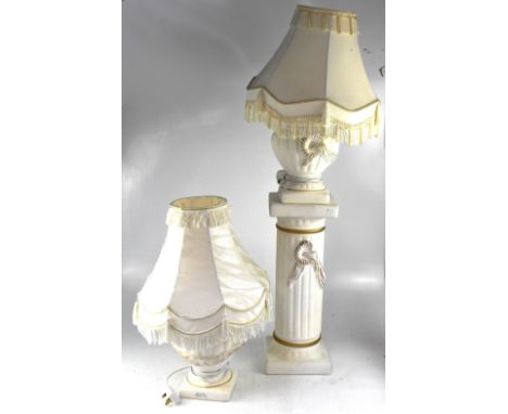 A bisque plaster-effect white baluster table lamp with decorative gilt swag, on a Classical column stand with gilt-heightened