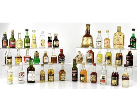 A collection of over seventy miniature bottles of alcohol to include Lambs Navy Rum, John Barr Finest Scotch Whisky, Bronte Y