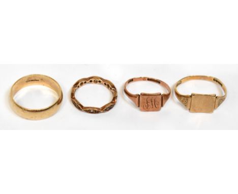 Four 9ct yellow gold rings including a broad wedding band, size T, two signet rings and an eternity ring, combined approx 10.