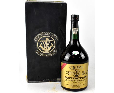 A presentation case containing a large bottle of Croft 1976 Port, aged for ten years in wood, bottled 1976, produce of Portug