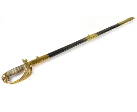 A Royal Navy Reserve sword, the blade etched with RNR with crown and anchor, amongst scrolling motifs, the reverse with a cre
