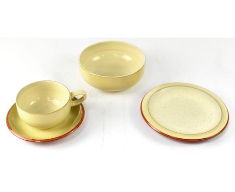 A Denby stoneware part dinner and tea service of yellow and cream ground, some with orange borders, comprising dinner plates,