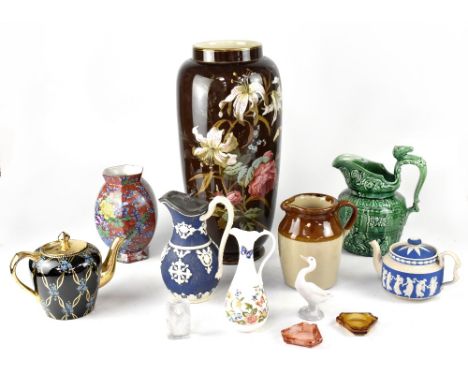 A quantity of ceramics and glass to include a Lladró goose, a Bohemian glass figure of a man holding a glass of beer, a Copel