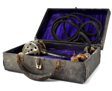 A vintage cased White Cross electric vibrator.  CONDITION REPORT Not tested.