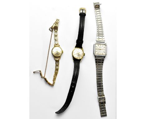 Polaris; a ladies' vintage 14kt gold watch, the silvered dial set with baton numerals, on a 9ct gold gate bracelet strap and 