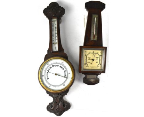Two early 20th century oak cased aneroid barometer/thermometers, one mounted with a white metal plaque inscribed 'Presented t