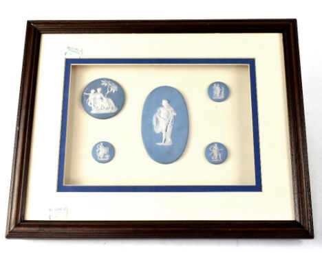 Five light blue jasper ware roundels with Classical maiden decoration, 17 x 25cm, framed and glazed. CONDITION REPORT One rou