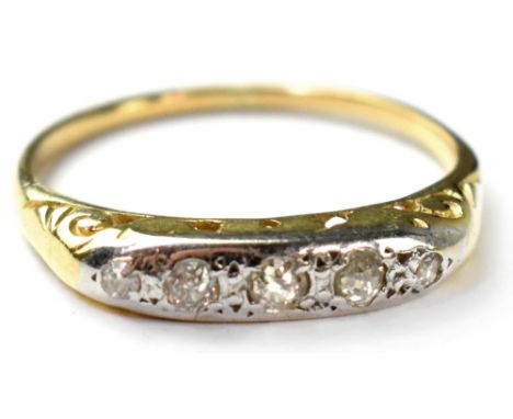 A vintage five stone diamond gold ring, the white gold head has five small graduated diamonds on a yellow gold shank, unmarke